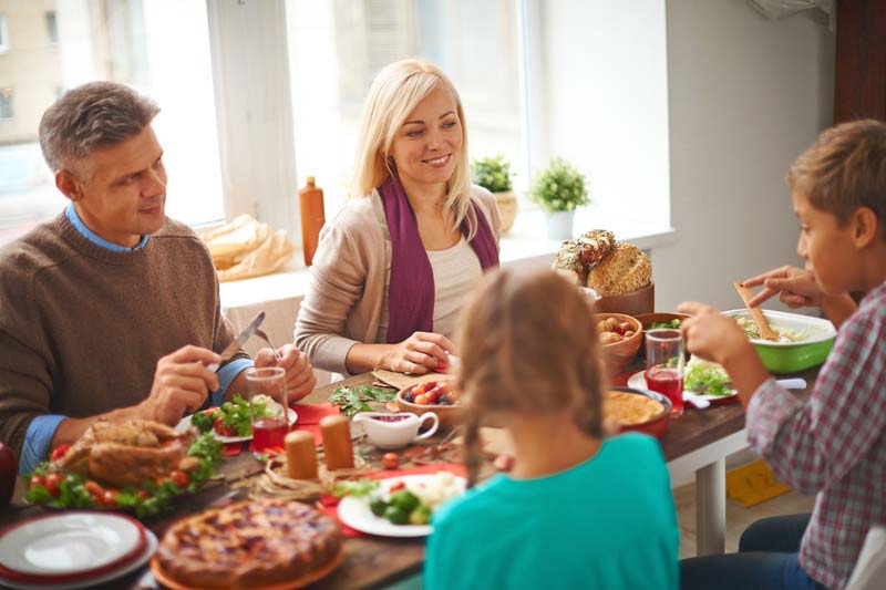HolidayFamily Family celebrating a holiday dinner together